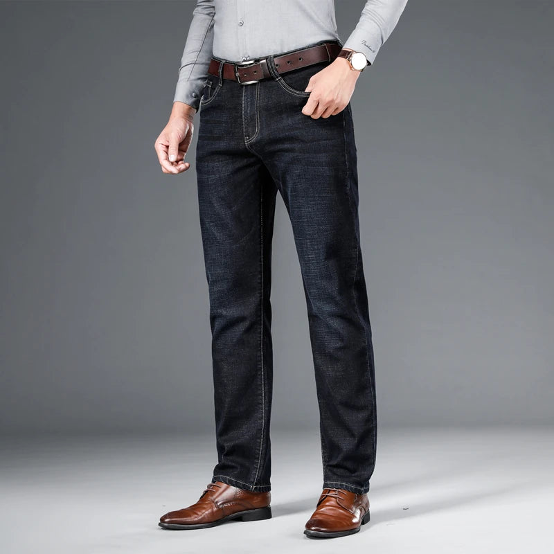 SHAN BAO 2026 autumn spring fitted straight stretch denim jeans classic style badge youth men's business casual jeans trousers