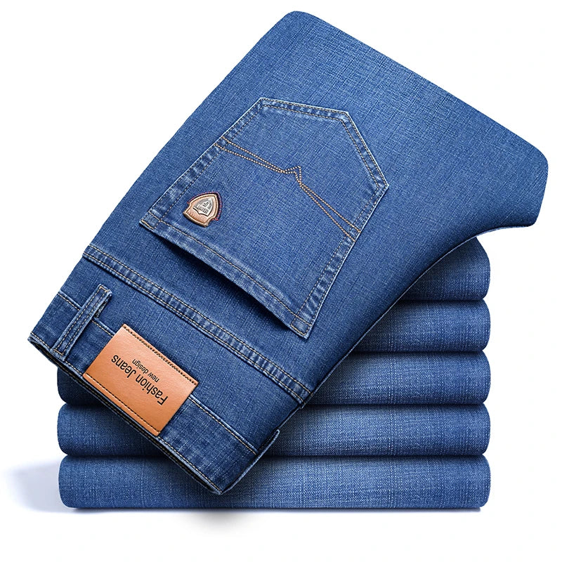SHAN BAO 2026 autumn spring fitted straight stretch denim jeans classic style badge youth men's business casual jeans trousers