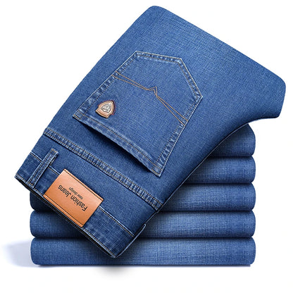 SHAN BAO 2026 autumn spring fitted straight stretch denim jeans classic style badge youth men's business casual jeans trousers