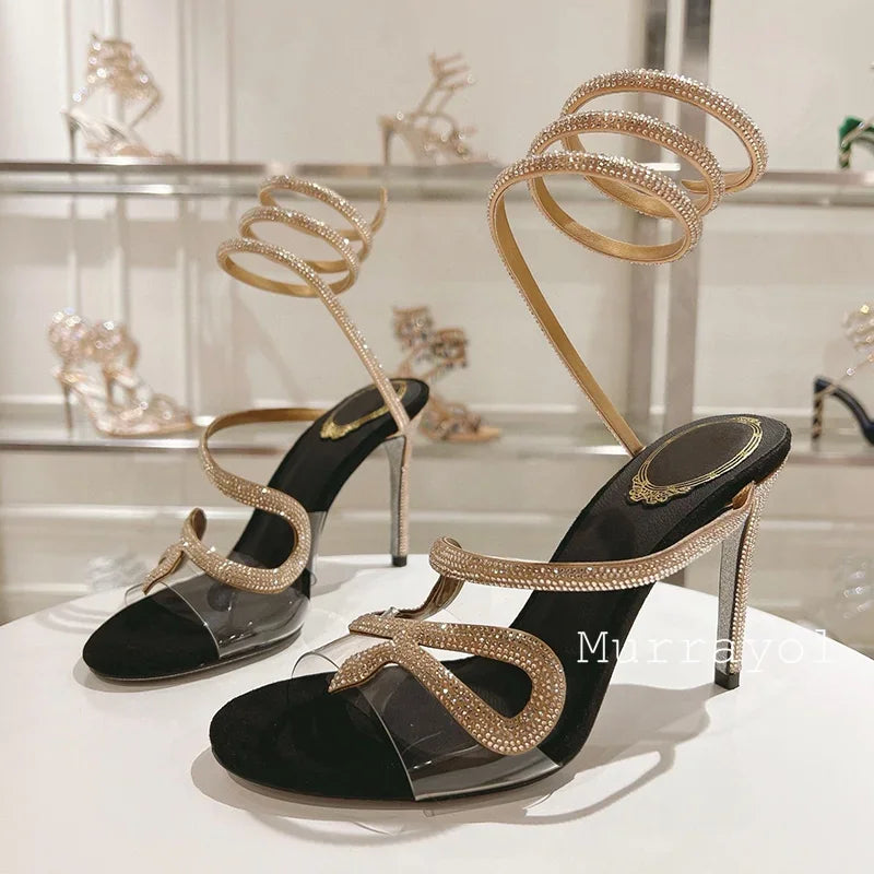 Crystal Decor Snake Shaped Elastic Strap Sandals Women PVC Transparent One Strap Thin Heels Sandalias Summer Dress Shoes Pumps