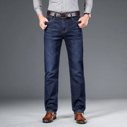 SHAN BAO 2026 autumn spring fitted straight stretch denim jeans classic style badge youth men's business casual jeans trousers