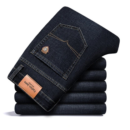 SHAN BAO 2026 autumn spring fitted straight stretch denim jeans classic style badge youth men's business casual jeans trousers